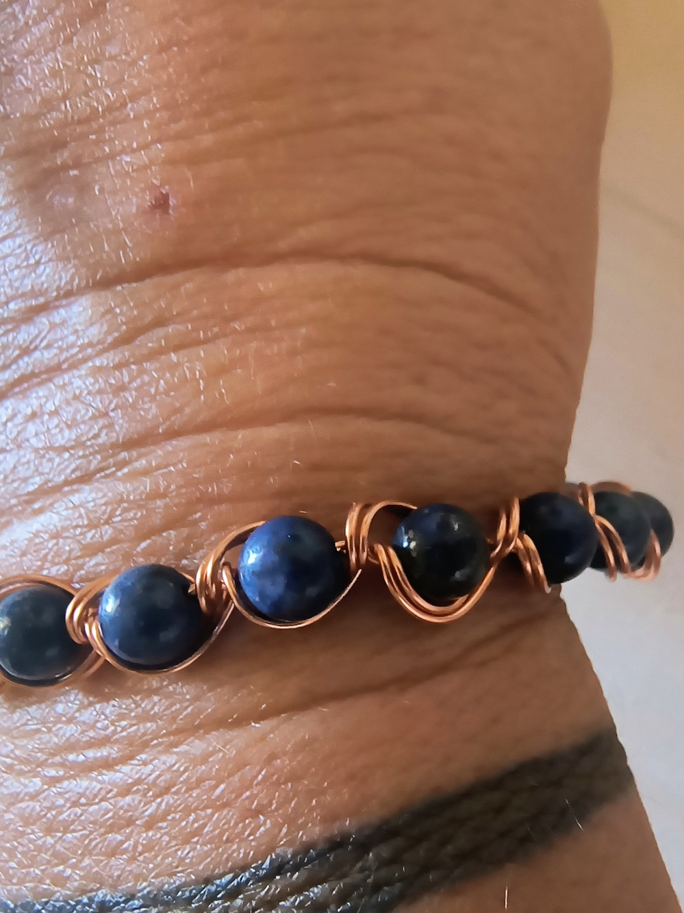Hand Crafted Copper Wire Bracelet with Deep Blue Beads